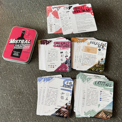 Collection of Mistral WineCards with various card types including core tools, grapes, regtions, terroir, and winemaking on a dark surface