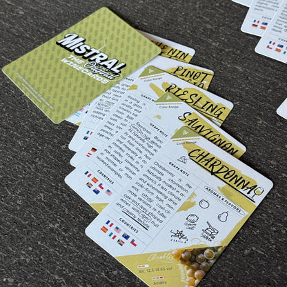 Collection of Mistral Grape WineCards on a dark surface