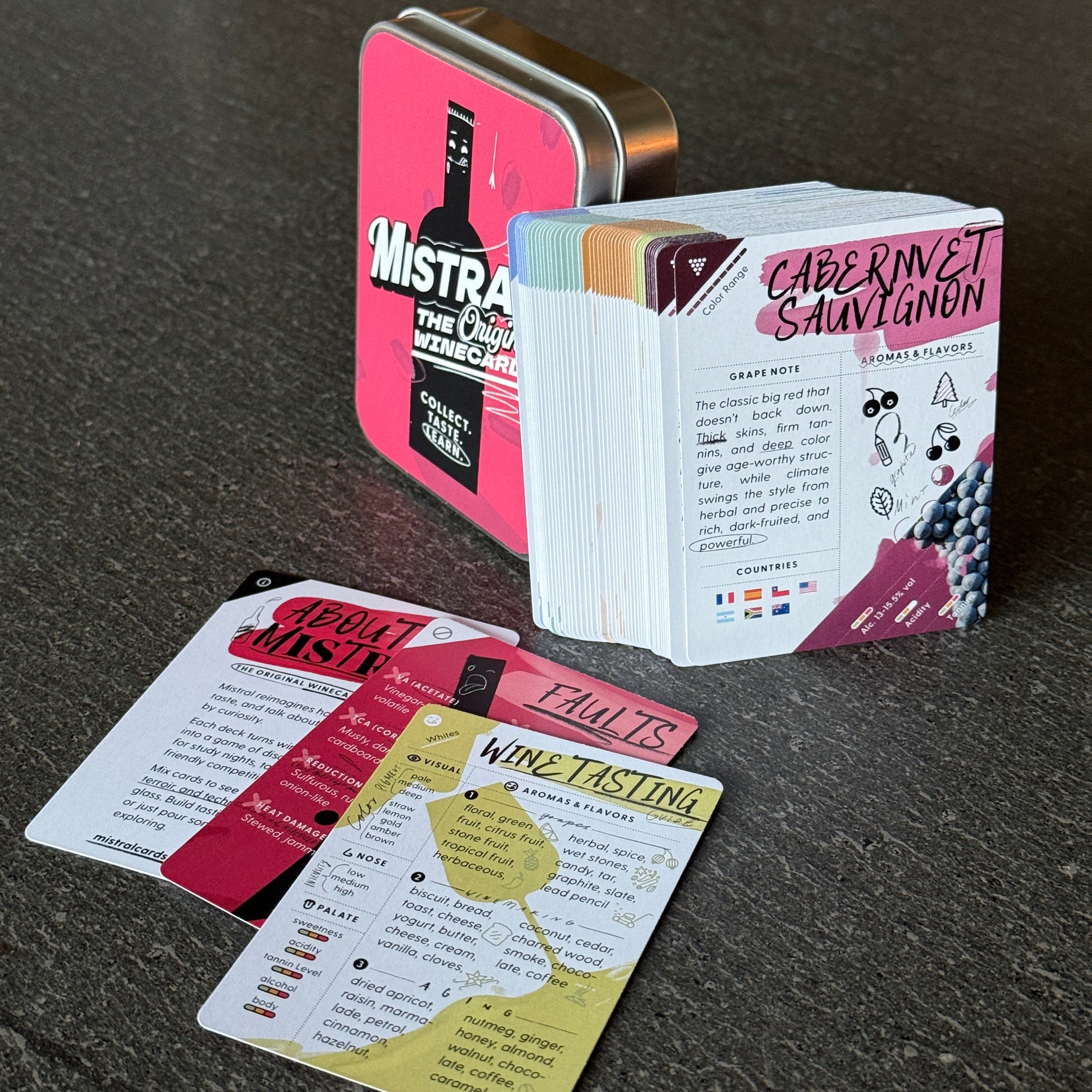 Mistral WineCards playing cards with visible text and design on a dark surface